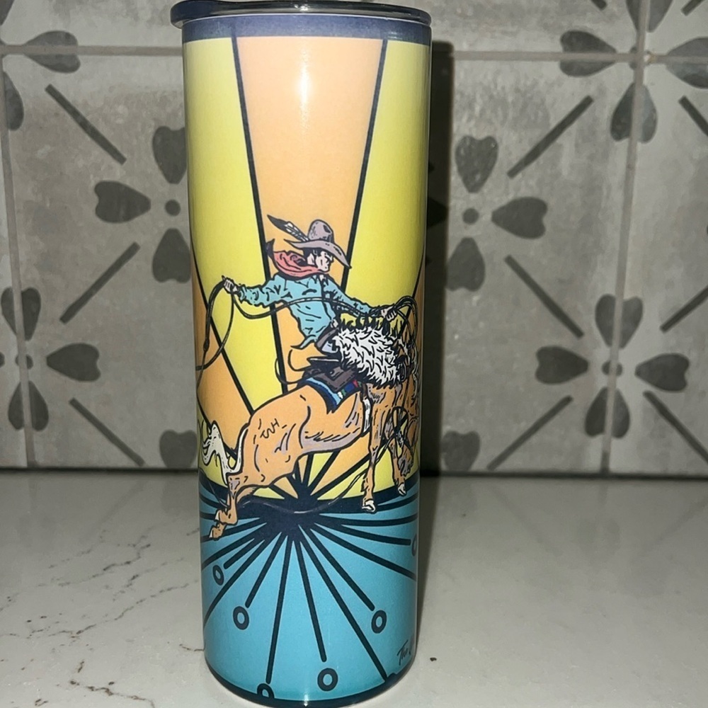 THE WHOLE HERD metal cowboy motif tall tumbler. Like new